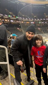 Sharks Star Luke Kunin greets T1T campers after a game